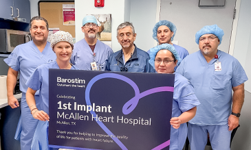 STHS Cardiac team holding Barostim flyer
