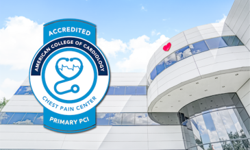 The chest pain badge superimposed over an image of the hospital