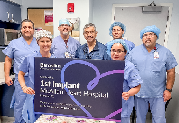 STHS Cardiac team holding Barostim flyer