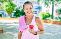 A woman smiling after exercising