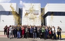 STHS employees celebrating 30th anniversary in front of the hospital